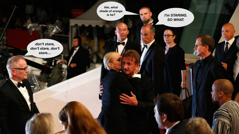 Illustration for article titled Charlize Theron Kisses Journalist Sean Penn